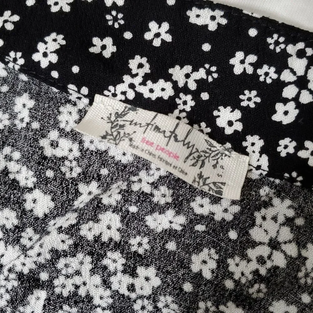 Free People Black and White Ditsy Floral Ruffled Bell Sleeve Bodysuit